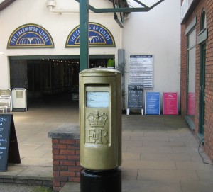 Gold Post Box at Carrington Centre, Eccleston